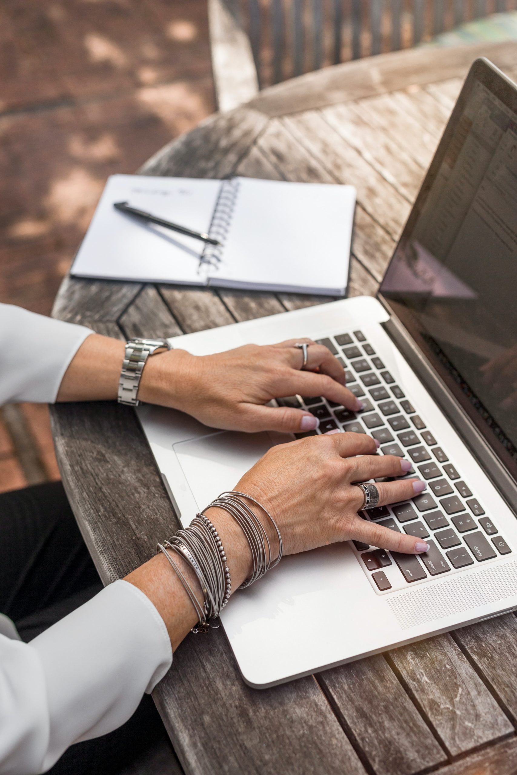 Filipino Virtual Assistant completing marketing tasks on their laptop